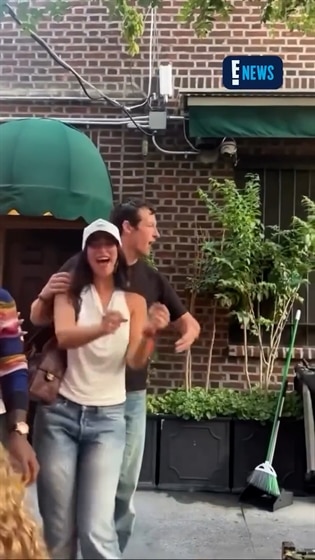 Dua Lipa and Callum Turner are having a great time