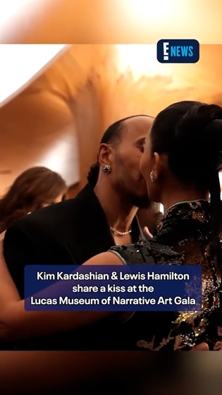Kim Kardashian and Lewis Hamilton share a sweet kiss